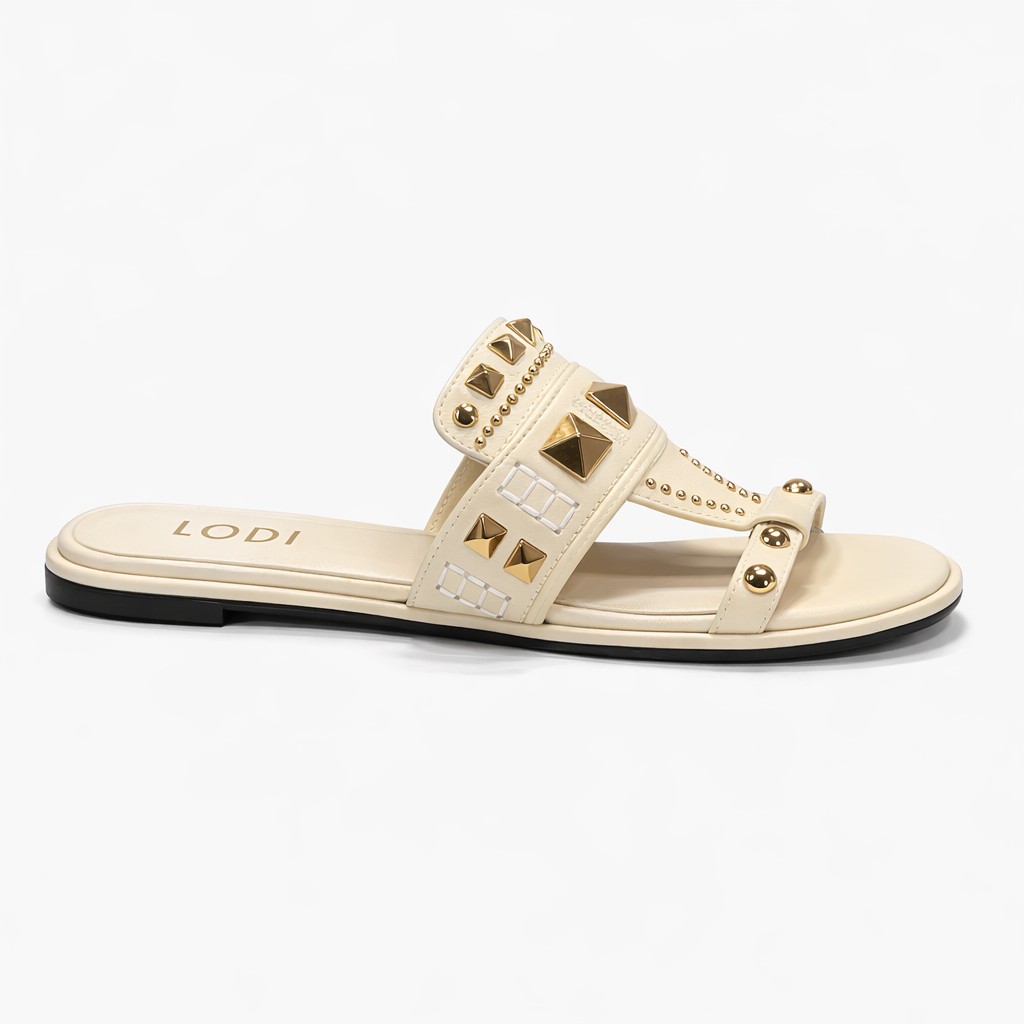 NUEVA COLECCIÓN. (zapato de muestra) Sandalia tachas crema