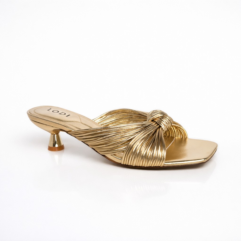 NUEVA COLECCIÓN. ( zapato de muestra) Sandalia mule nudo oro